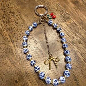 Gold Bow Charm Beaded Keychain with Blue Floral Beads